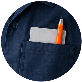 Navy uniform shirt pocket with notepad and orange pencil